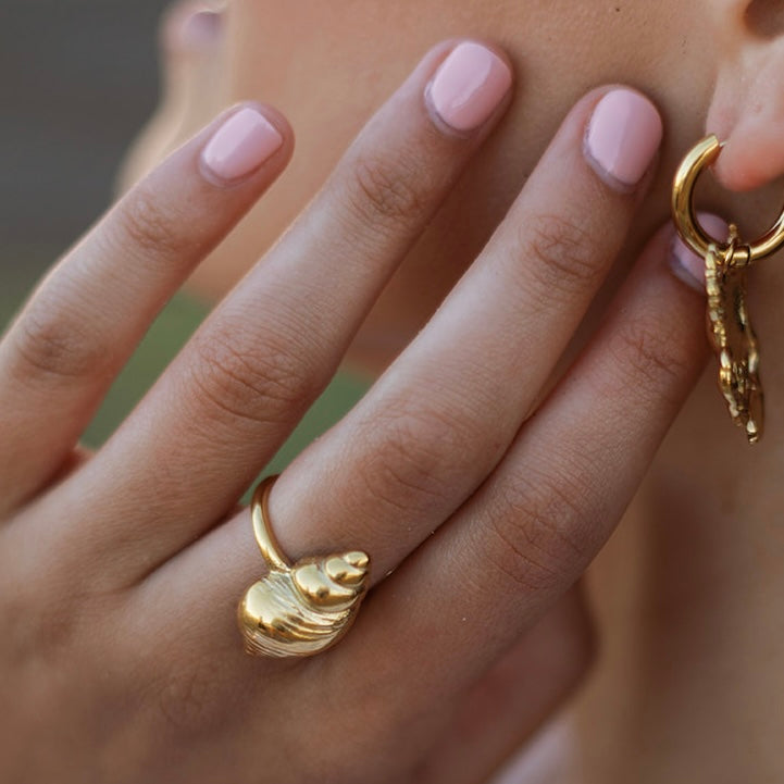 
                      
                        Amalia Conch Shell Adjustable Ring
                      
                    