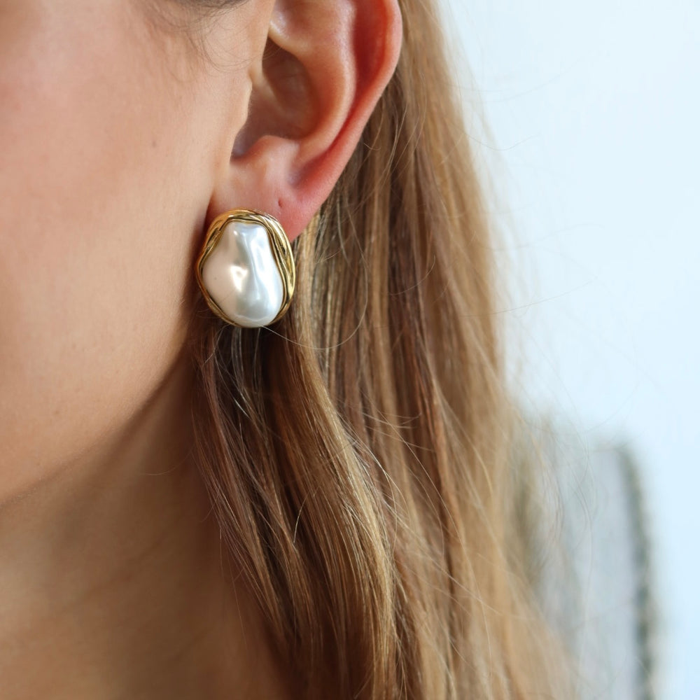 
                      
                        Irregular Shape Pearl Stud Earrings
                      
                    