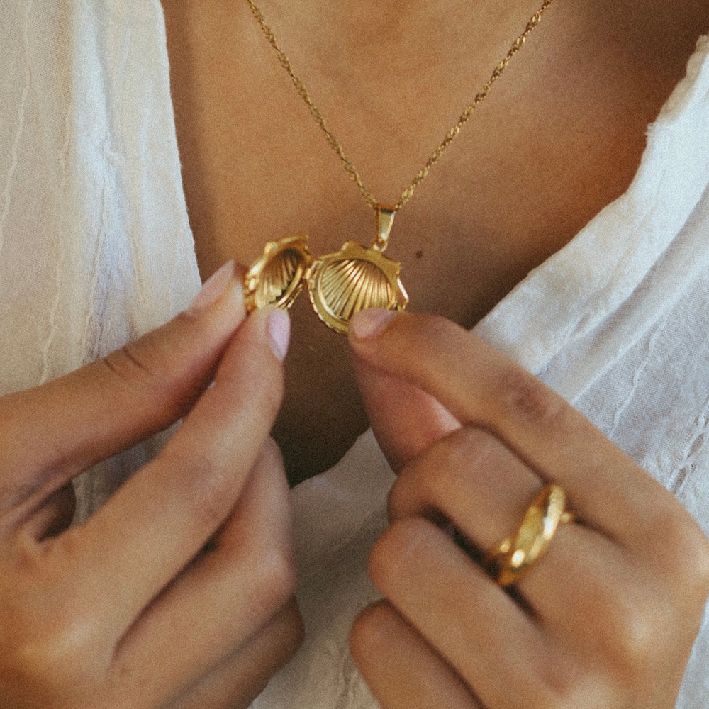 
                      
                        Shell Locket Necklace
                      
                    