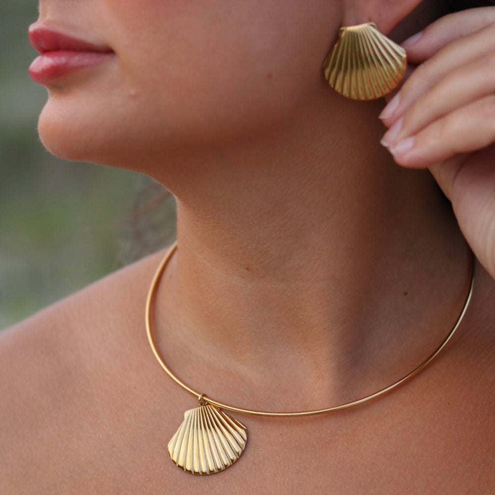 
                      
                        Delphine Structured Shell Necklace
                      
                    