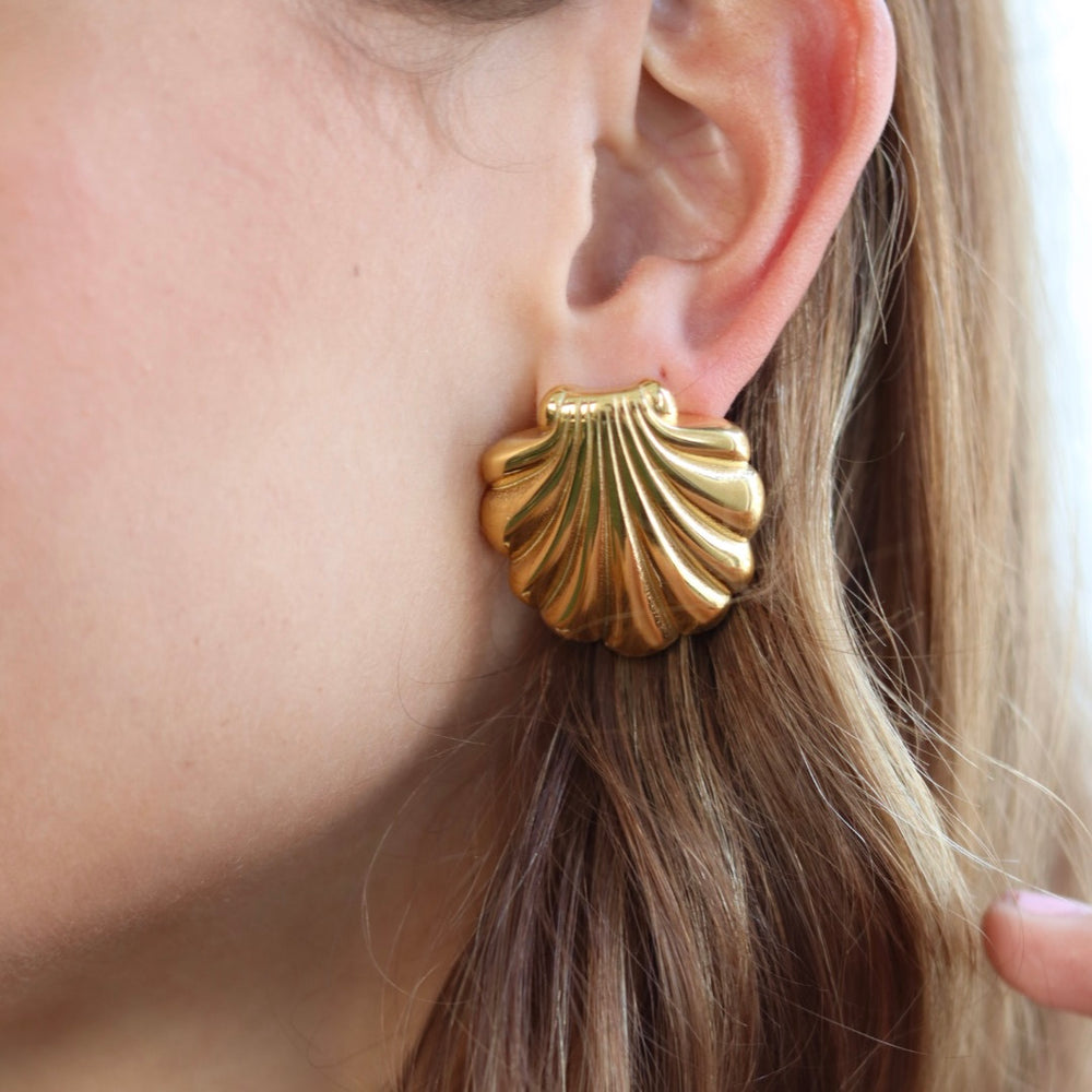 
                      
                        Palace Shell Earrings
                      
                    