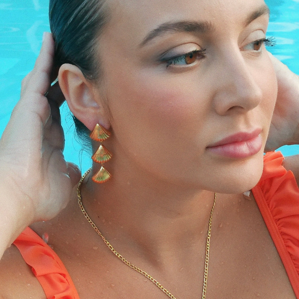 
                      
                        Brisa Triple Shell Drop Earrings
                      
                    