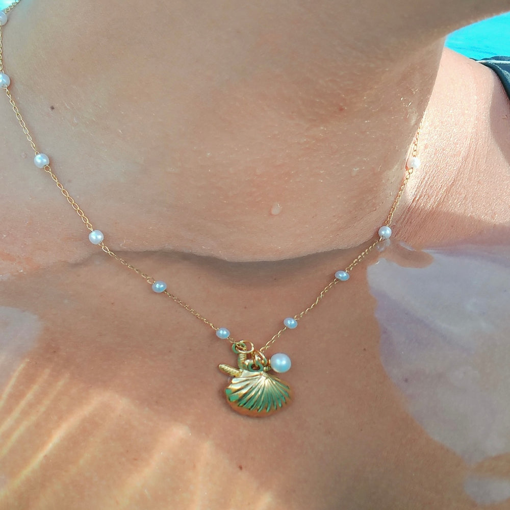 
                      
                        Azure Starfish & Pearl Shell Necklace
                      
                    