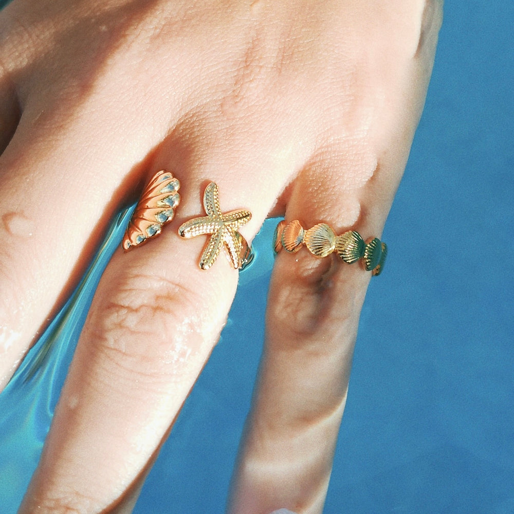 
                      
                        Coralie Scallop Shell Adjustable Ring
                      
                    